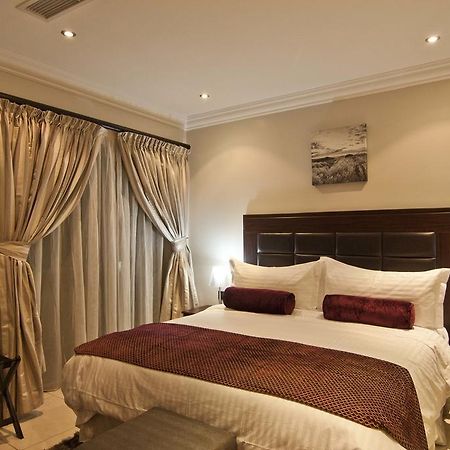 L'Eola Suites Abuja Pokoj fotografie