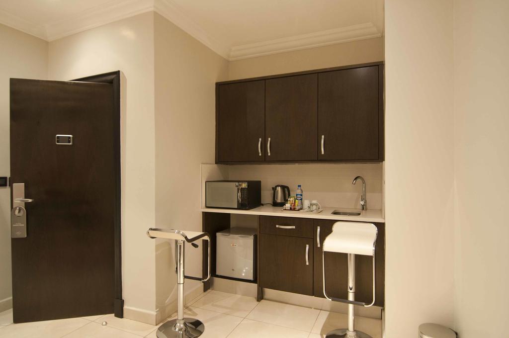 L'Eola Suites Abuja Pokoj fotografie